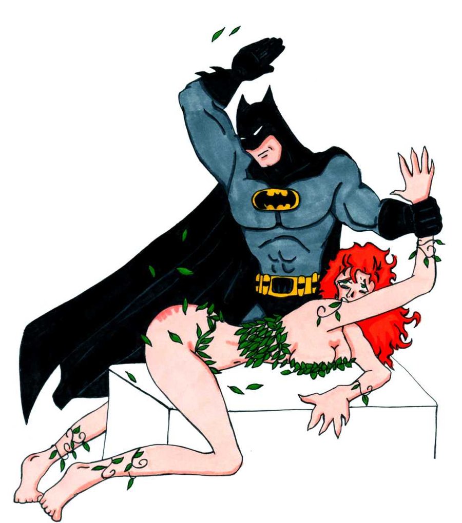 batman spanking poison ivy as she's bent over a bench.